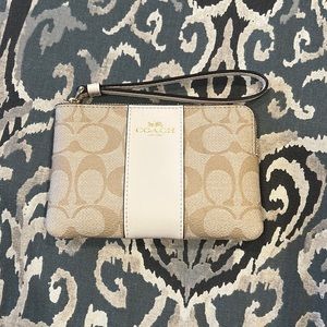 Coach Corner Zip Wristlet In Signature Canvas
